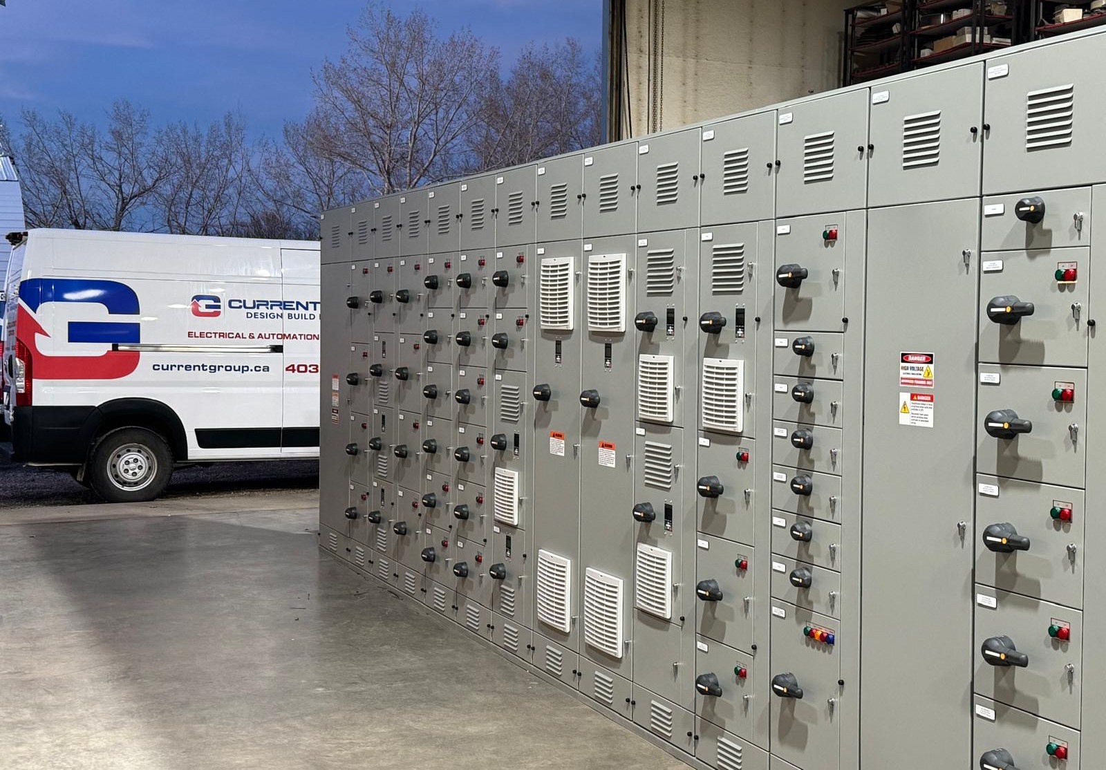 Gas plant electrical systems showing switchgear panels and power distribution equipment inside the facility.